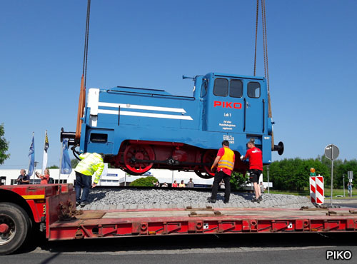 locomotive is carefully winched up.
