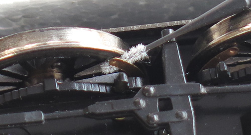 micro brush to carefully clean between the locomotive wheel and pickup.