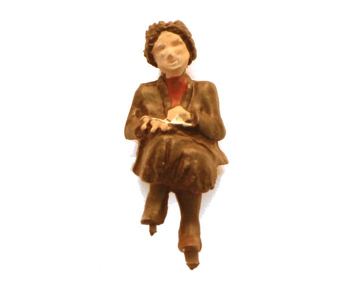 Seated Female Passenger with Legs Crossed Figure