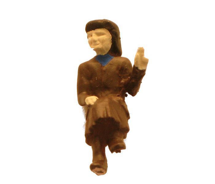 Seated Female Passenger with Hand Raised Figure