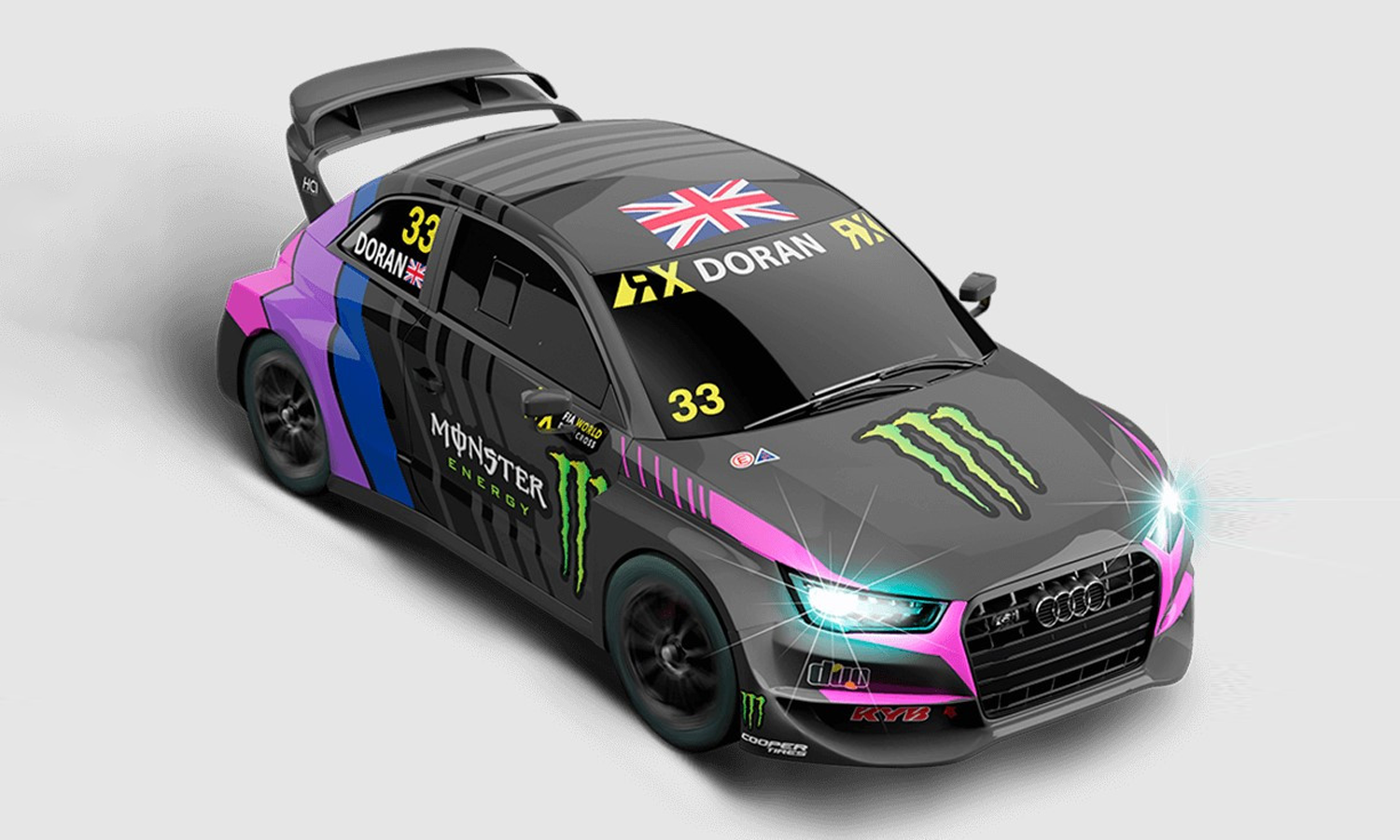 A black SCX Compact slot car with Monster Energy branding.