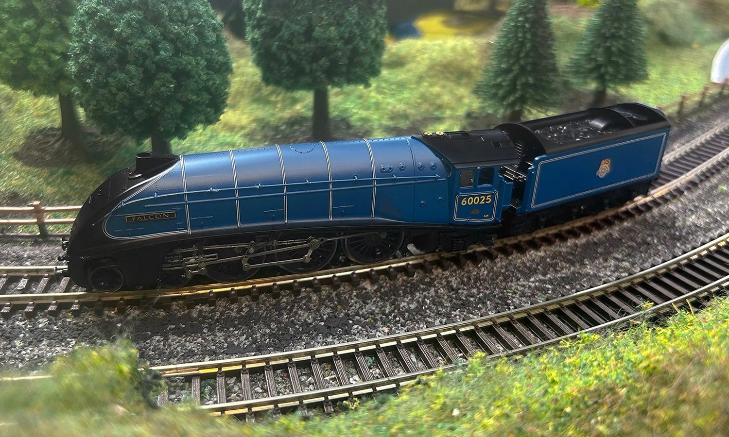 A blue model British railway locomotive